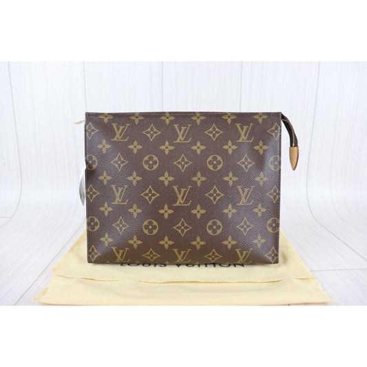 Rank A | LV Monogram Pochette Toilette 26 |092911