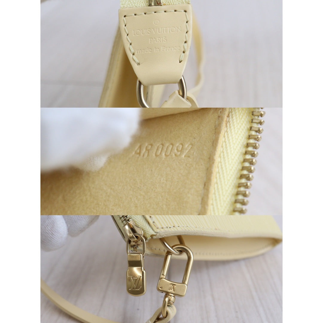 Rank SA |LV Epi Pochette Accessoir Handbag |23022412