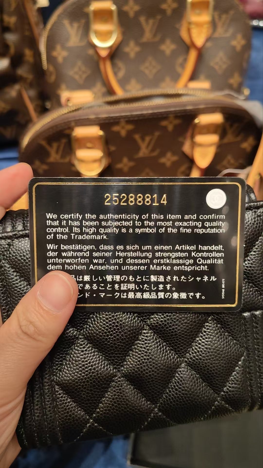 CHANEL Leboy Caviar Skin Black Wallet