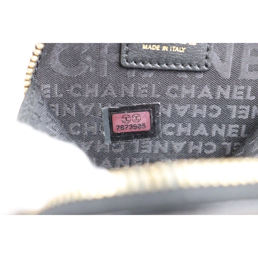 Rank A ｜CHANEL  Lamb Leather Camellia Coin Holder｜V23102827