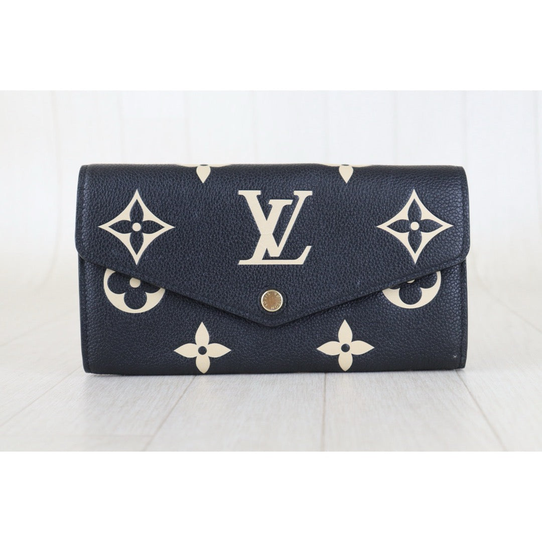 Official price: ¥147,400 JPY ｜ Include Entrupy Certificate of Authenticity｜Very Good ( Rank A)｜ Louis Vuitton Monogram Empreinte Long Wallet Black and Turtledove｜Z26100208