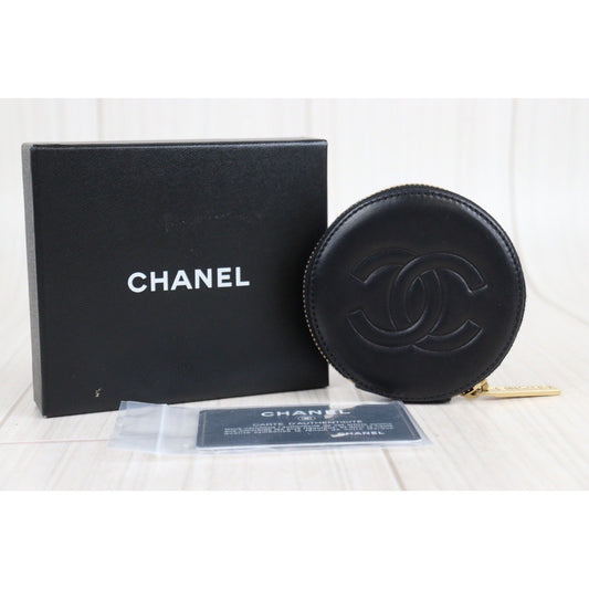 Sold at Auction: Chanel Black Lambskin CC Camellia Round Coin Case